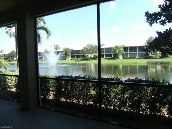 a view of a lake from a balcony