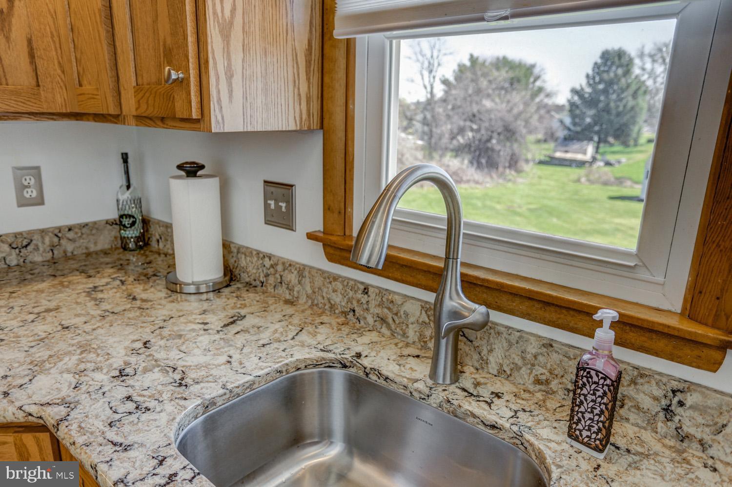 31 Trail Road South Elizabethtown, PA 17022 - Photo 16 of 40 a kitchen with a window a sink and a counter top space