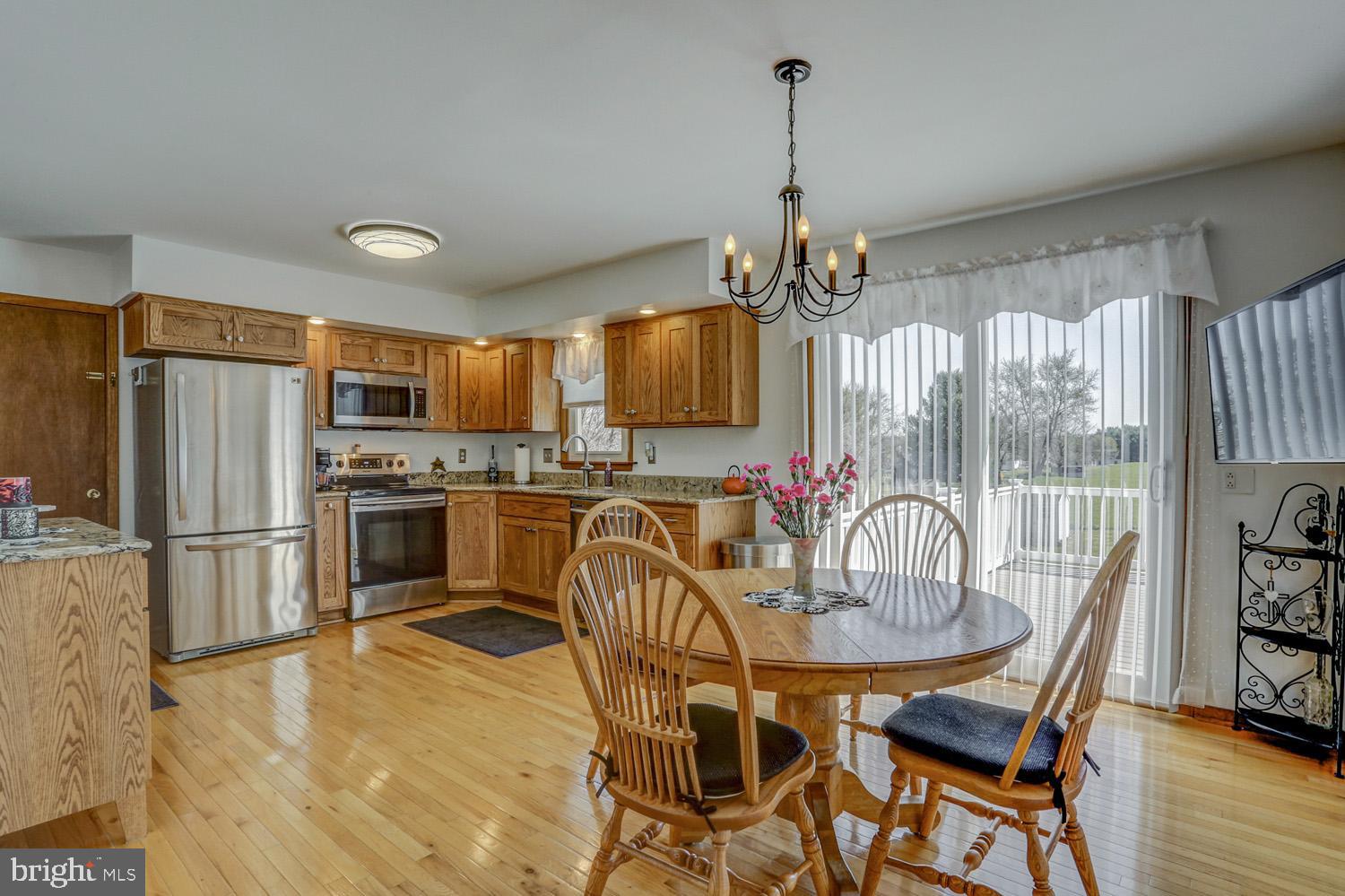 31 Trail Road South Elizabethtown, PA 17022 - Photo 9 of 40 a kitchen that has a table chairs stainless steel appliances and cabinets
