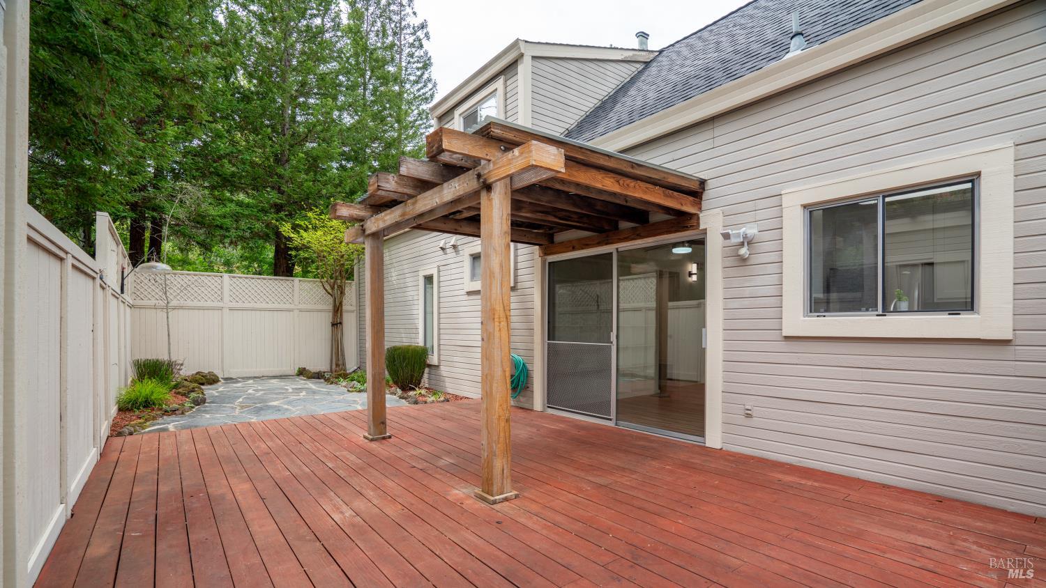 3335 Yulupa Avenue Santa Rosa, CA 95405 - Photo 12 of 33 Private backyard adjacent to kitchen and dining room offering space to relax, entertain, and enjoy outdoor living.