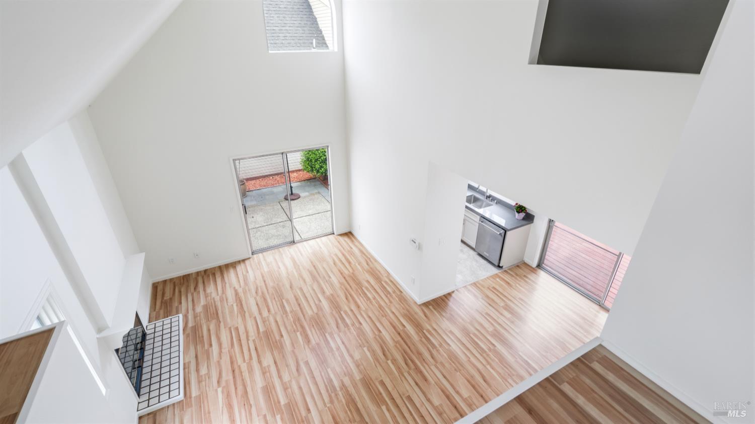 3335 Yulupa Avenue Santa Rosa, CA 95405 - Photo 19 of 33 From upstairs, enjoy views looking down into the light-filled living room.