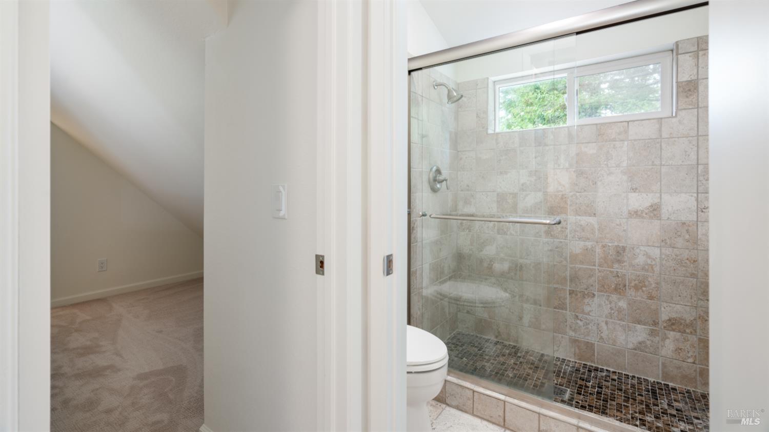 3335 Yulupa Avenue Santa Rosa, CA 95405 - Photo 29 of 39 a bathroom with a shower and toilet