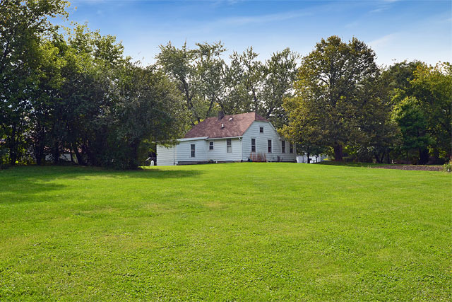 221 Haman Road Barrington, IL 60010 - Photo 2 of 9 a front view of a house with garden
