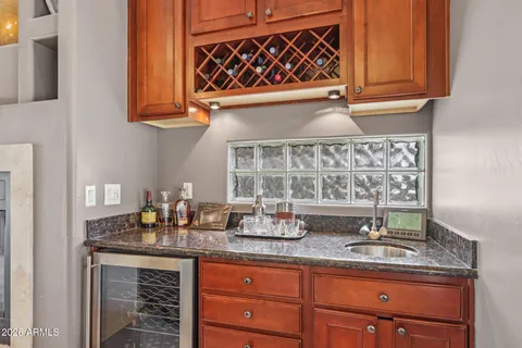 a large bathroom with double vanity and a large mirror