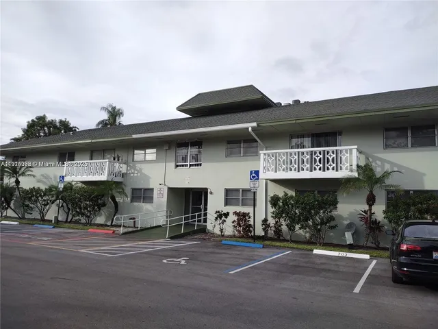 a view of a street with cars