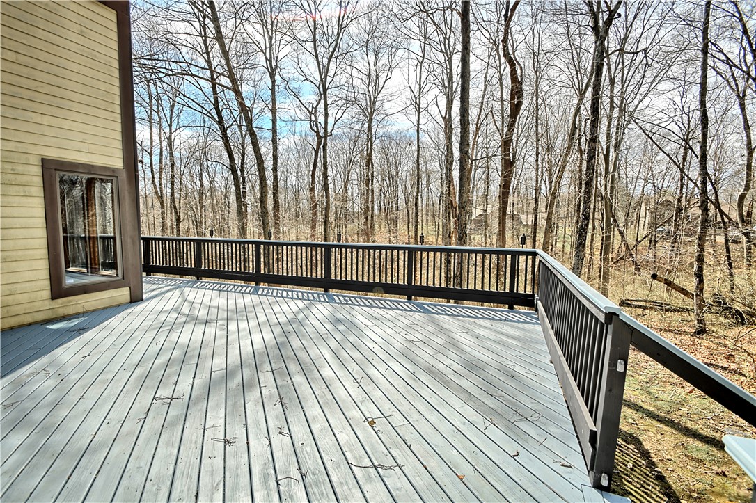 8711 Nicole Lane Springboro, OH 45066 - Photo 79 of 87 Enjoy the peaceful wooded scenery from this expansive outdoor deck.