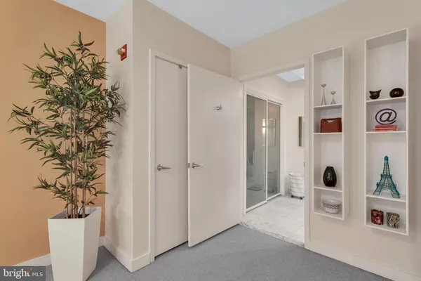 a view of entryway with livingroom and hallway view