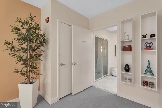 a view of entryway with livingroom and hallway view