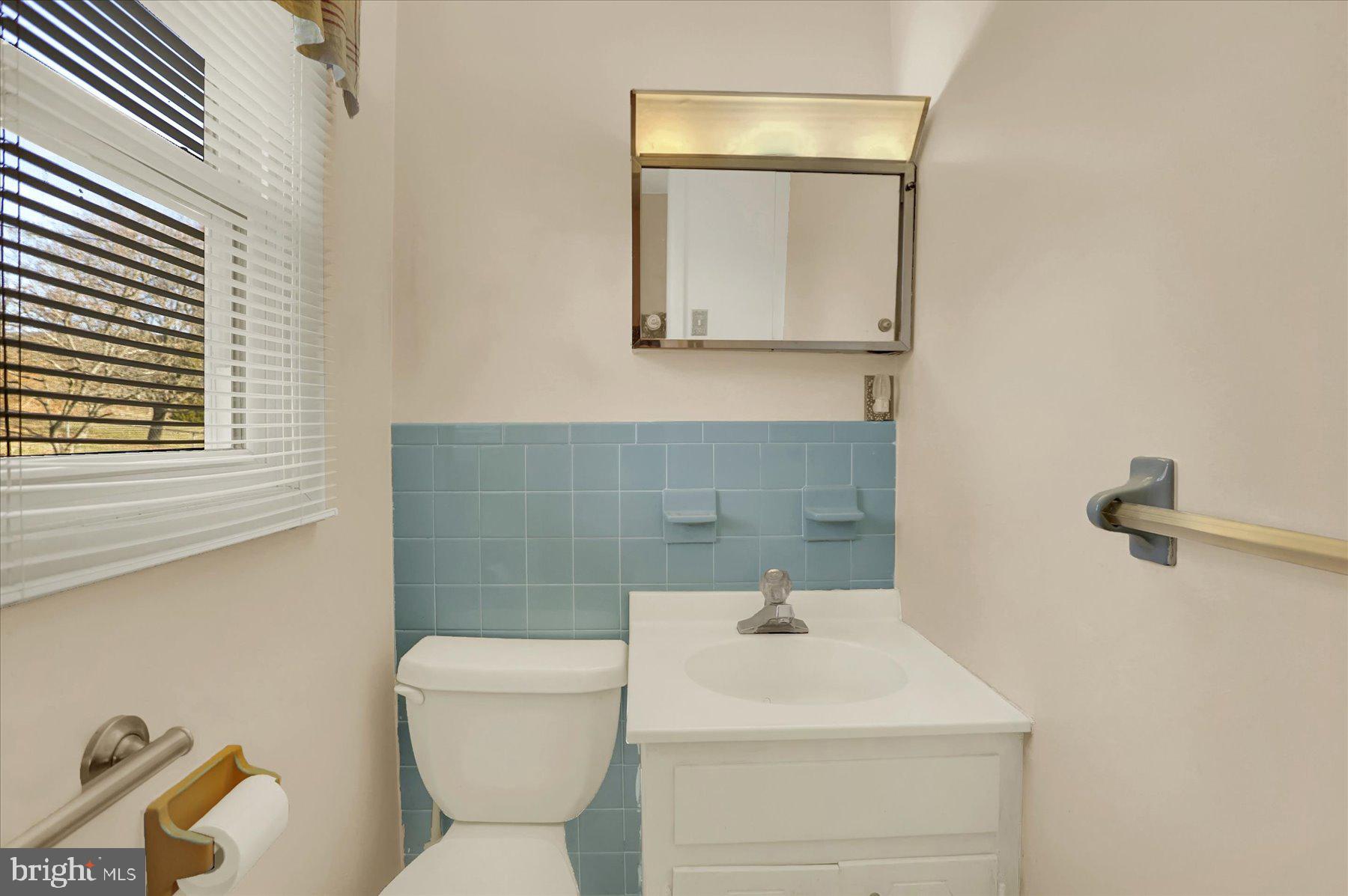 970 Cranes Gap Road Carlisle, PA 17013 - Photo 28 of 48 a bathroom with a toilet sink and mirror