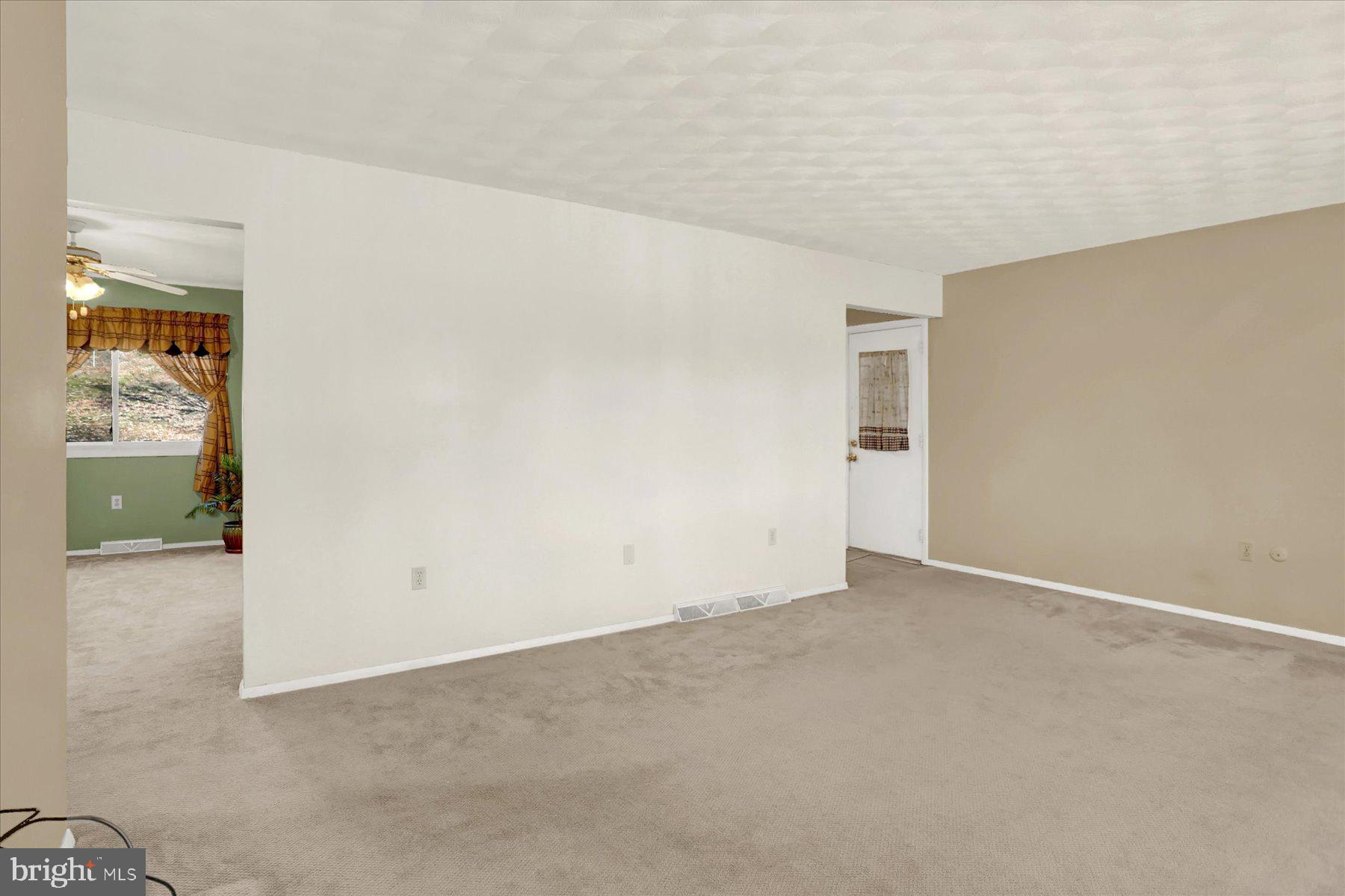 970 Cranes Gap Road Carlisle, PA 17013 - Photo 5 of 48 an empty room with entrance door