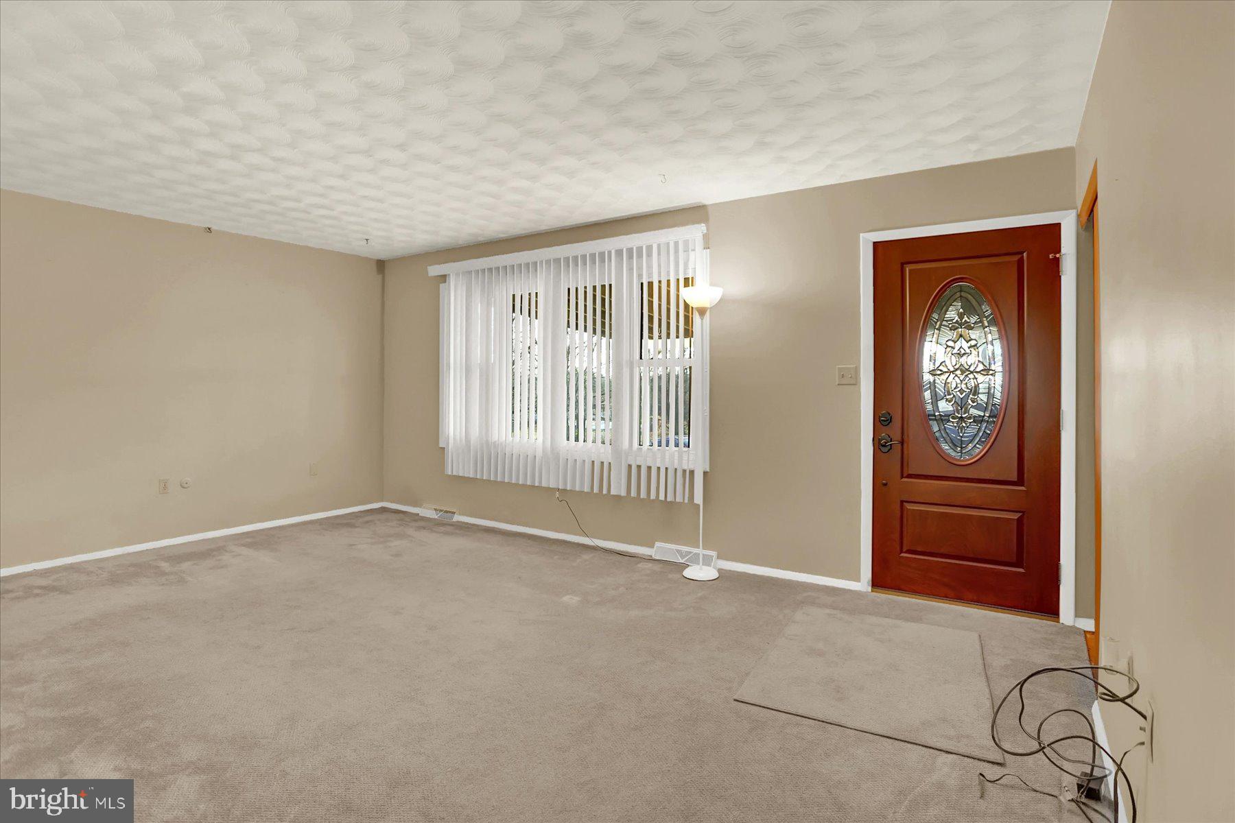 970 Cranes Gap Road Carlisle, PA 17013 - Photo 8 of 48 an empty room with windows