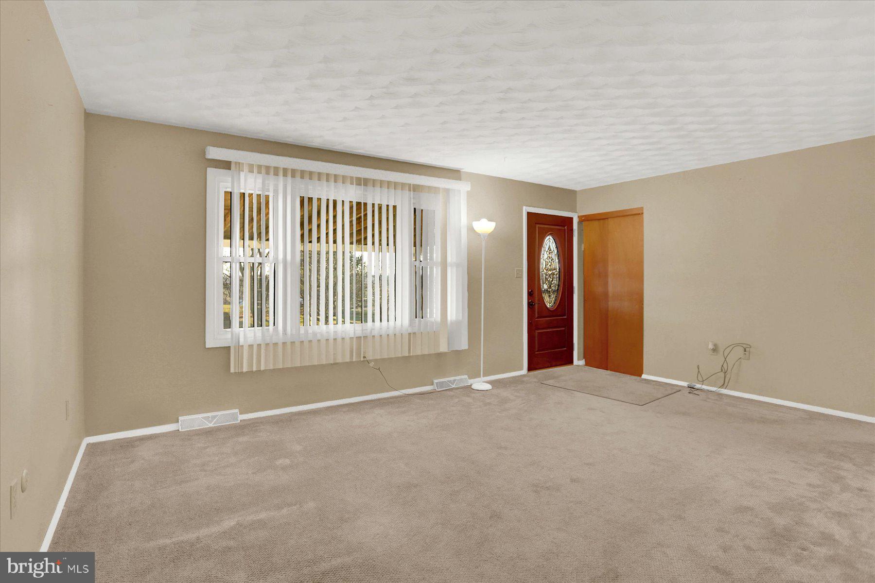 970 Cranes Gap Road Carlisle, PA 17013 - Photo 9 of 48 a view of an empty room with a window