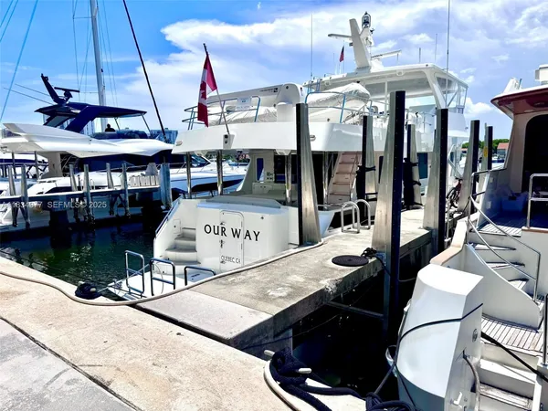 a view of a chairs and table in a patio
