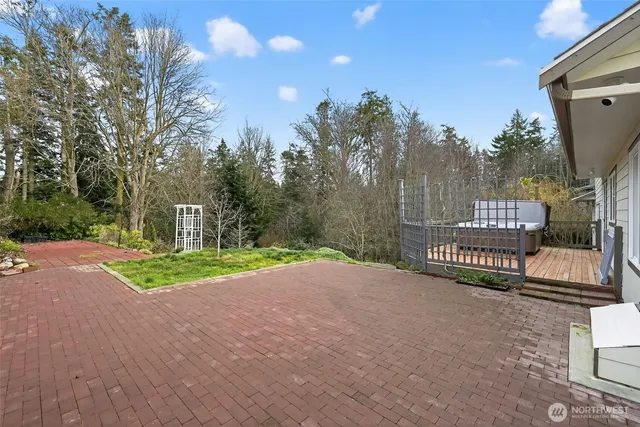 a view of a street with brick building in the background