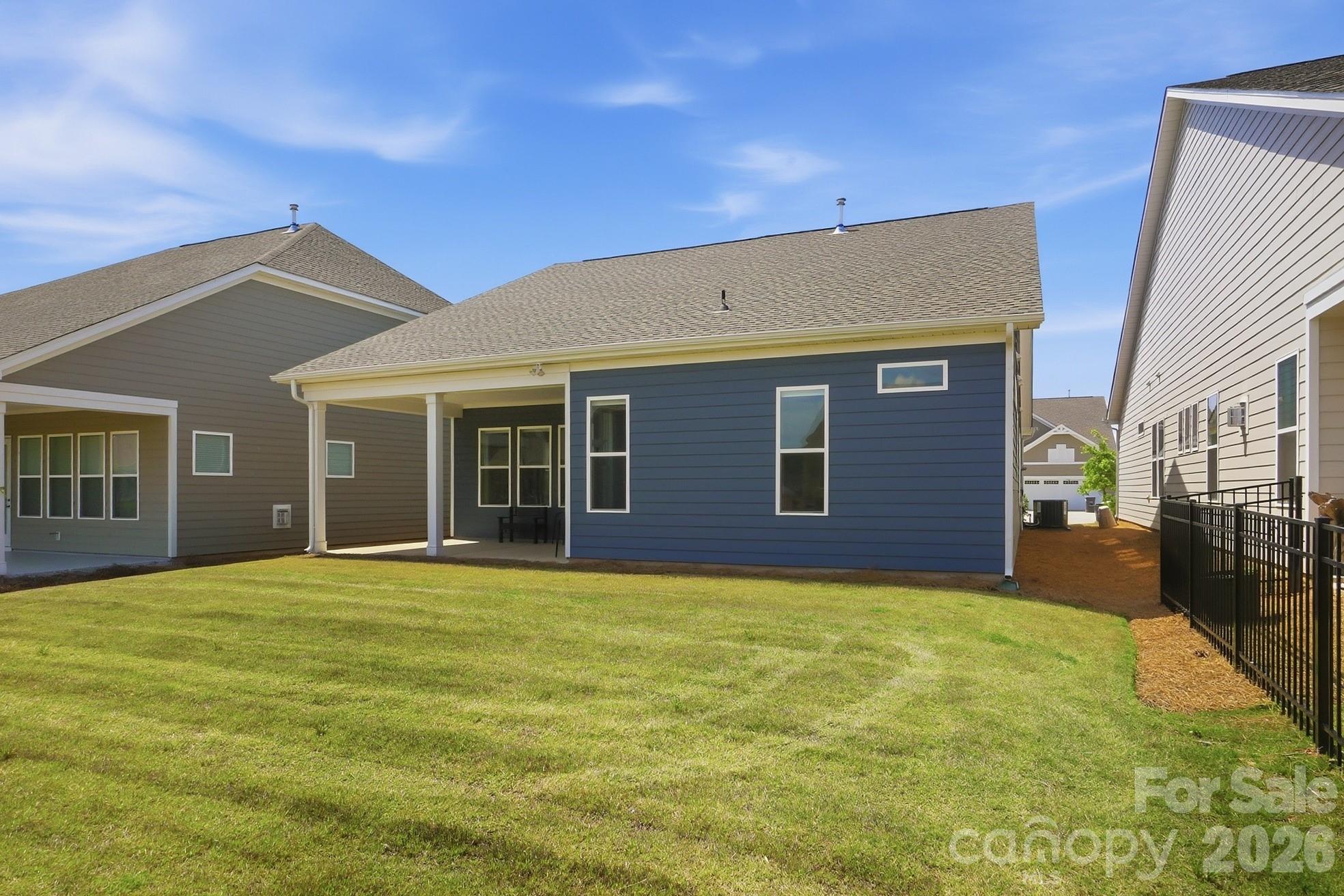 1035 Rabbit Hl Lane Monroe, NC 28110 - Photo 30 of 39 a view of a house with a yard