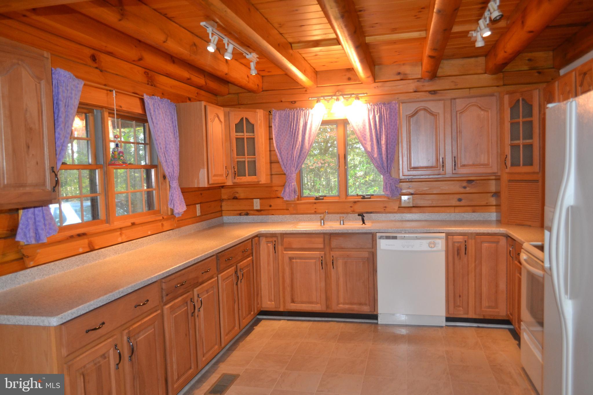 23950 Mt Pleasant Road St. Michaels, MD 21663 - Photo 17 of 38 Great Kitchen - Corian counters & beamed ceiling
