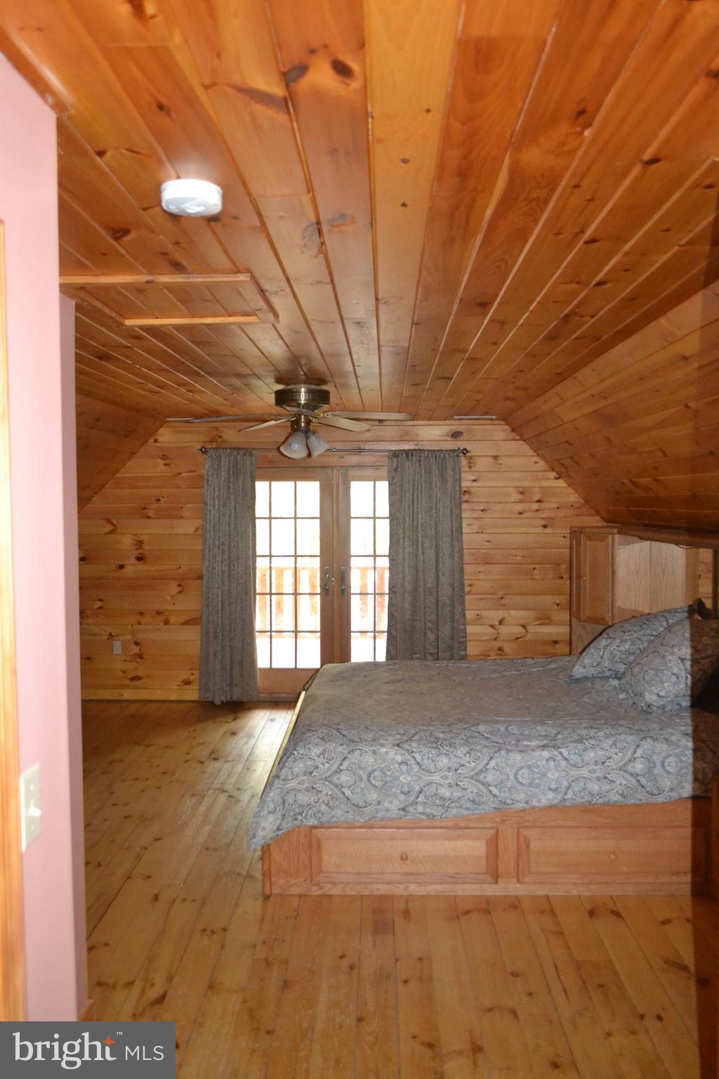 23950 Mt Pleasant Road St. Michaels, MD 21663 - Photo 27 of 38 Master Bedroom with access to the upper Balcony