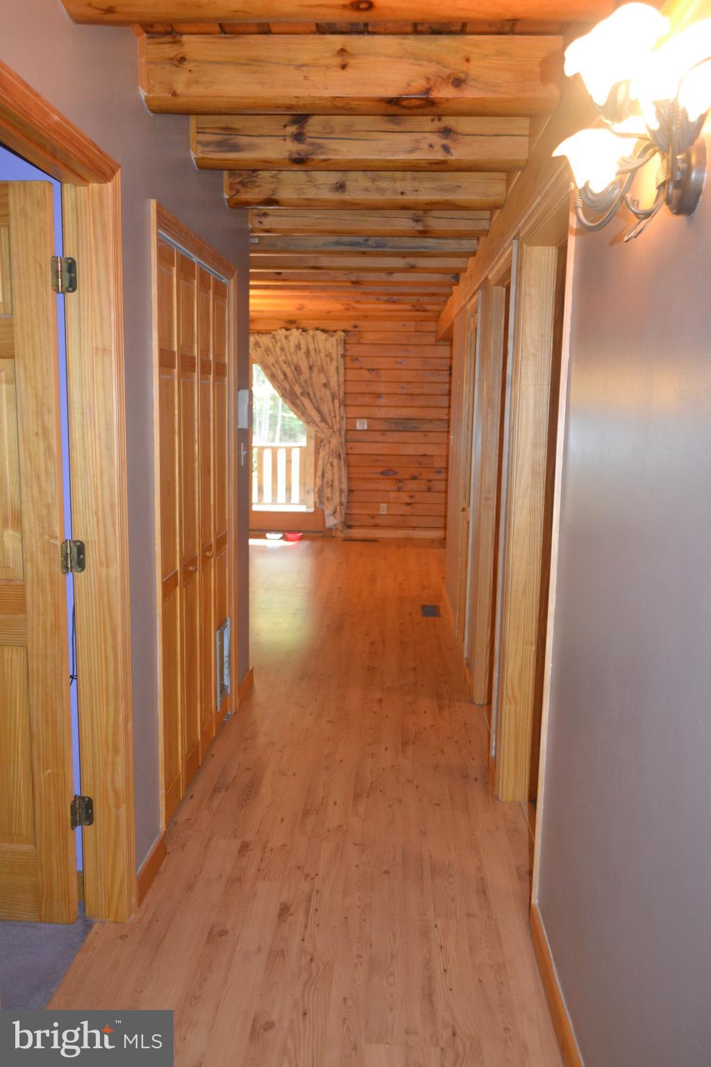 23950 Mt Pleasant Road St. Michaels, MD 21663 - Photo 33 of 38 Hallway to 1st floor Laundry Room and Bedroom Wing