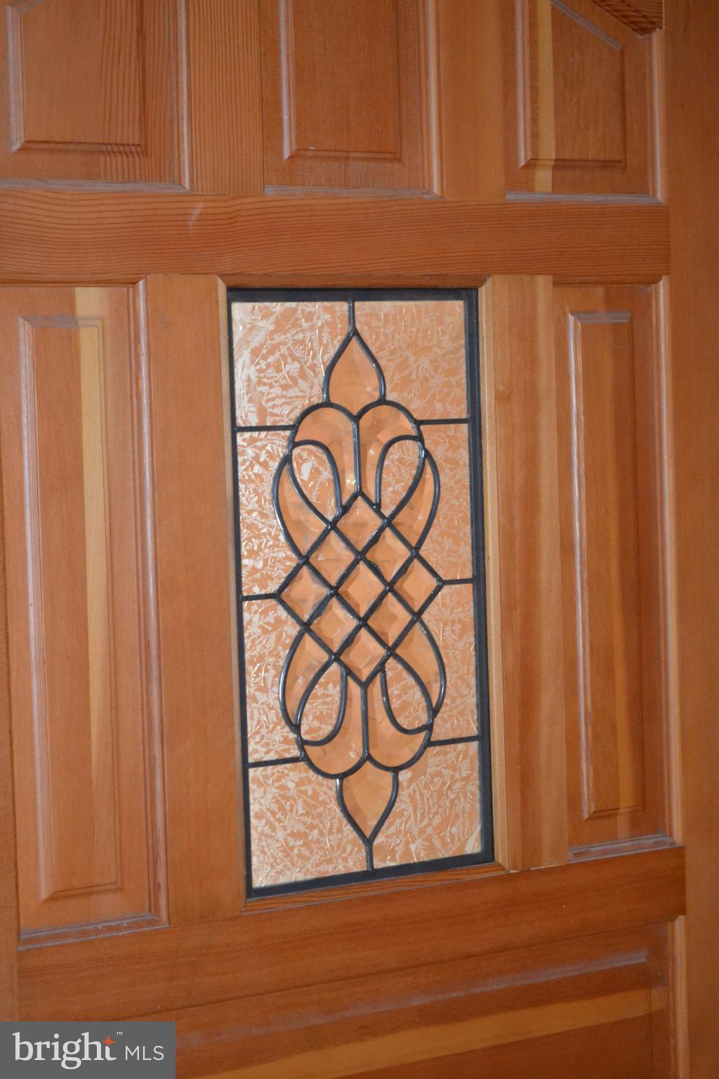 23950 Mt Pleasant Road St. Michaels, MD 21663 - Photo 9 of 38 Lovely Stain Glass window in the Front door