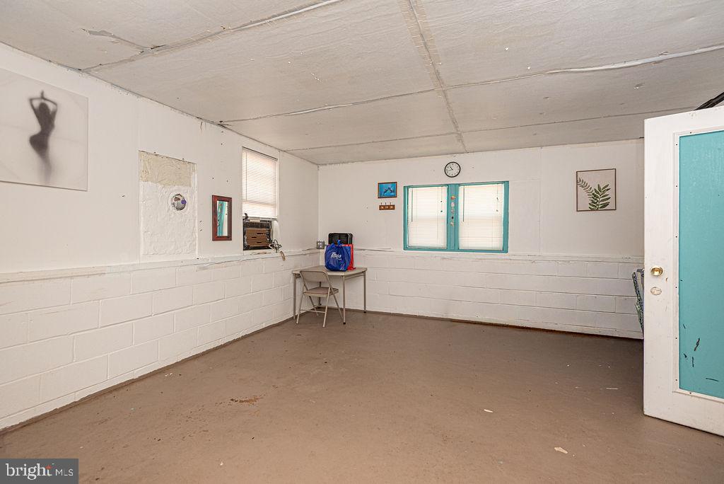 36107 Camp Barnes Road Frankford, DE 19945 - Photo 49 of 83 a view of an empty room with a window
