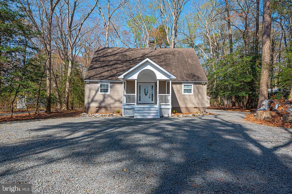 36107 Camp Barnes Road Frankford, DE 19945 - Photo 54 of 83 a front view of a house with a yard