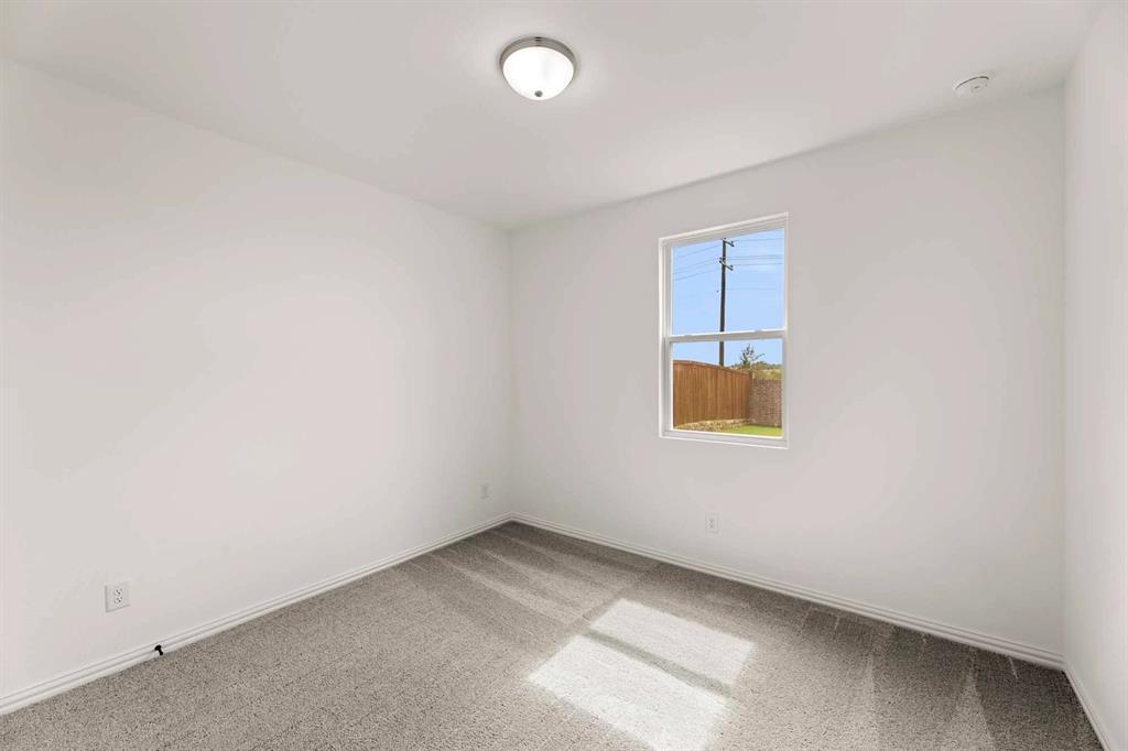 1304 Abbott Crk Road Celina, TX 75009 - Photo 17 of 29 an empty room with a window