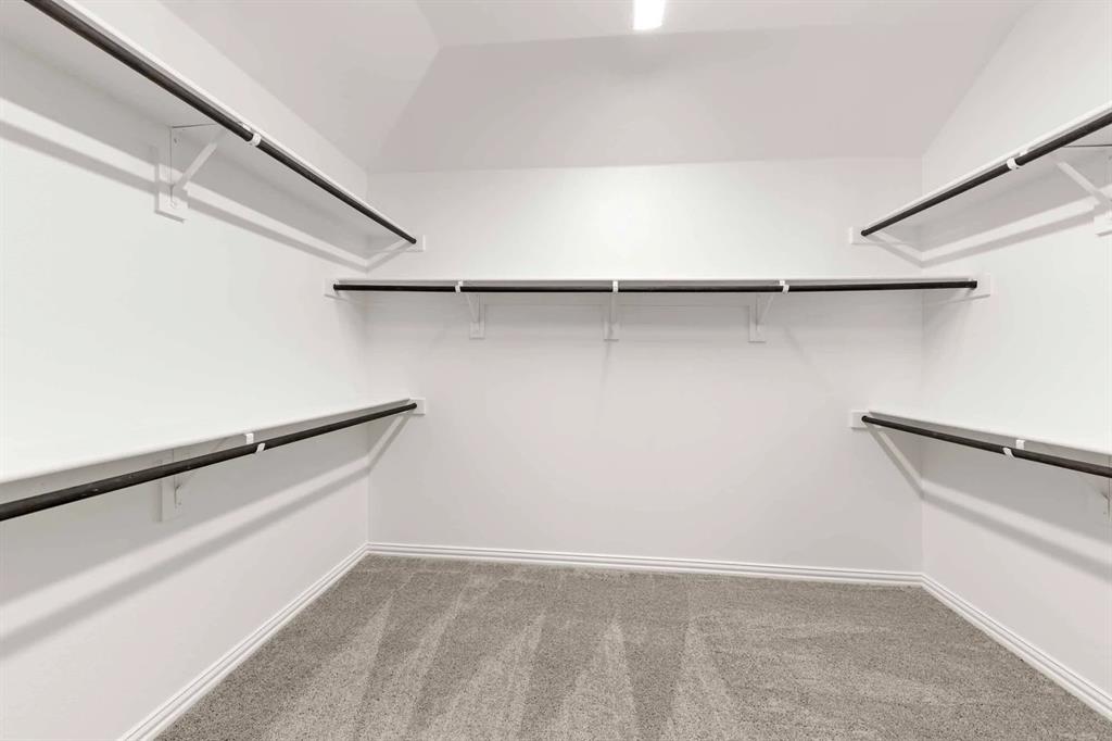 1304 Abbott Crk Road Celina, TX 75009 - Photo 29 of 29 a view of an empty walk in closet