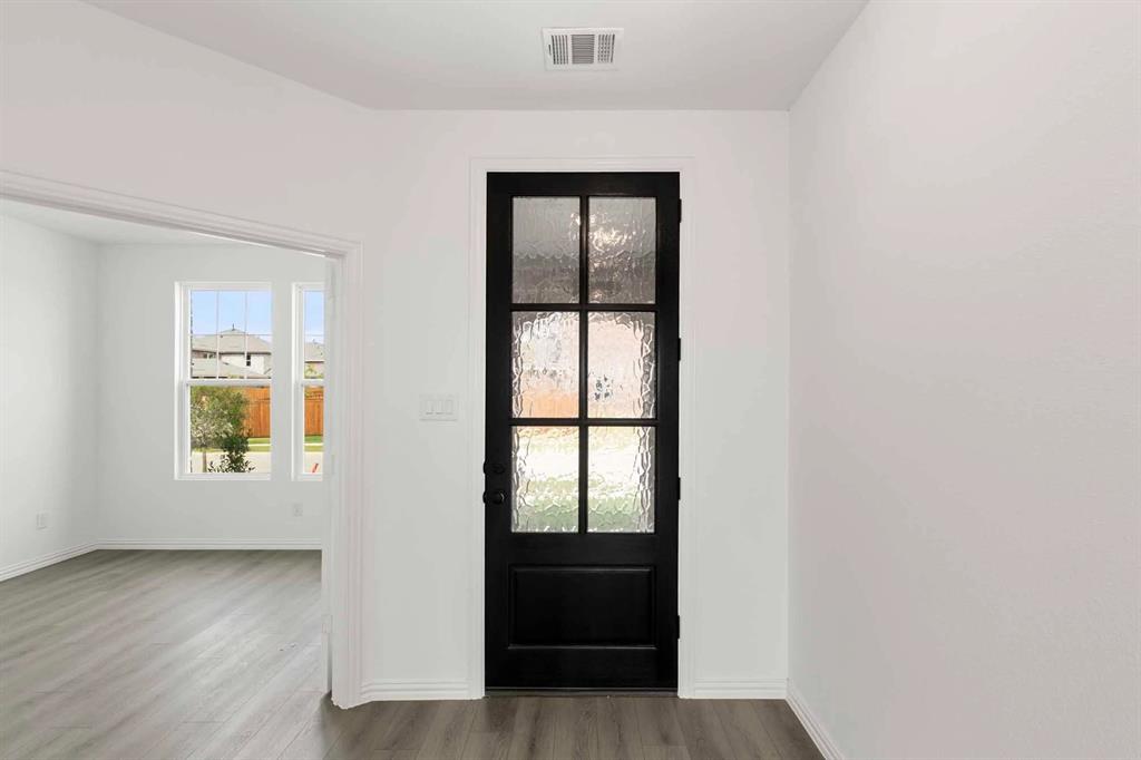 1304 Abbott Crk Road Celina, TX 75009 - Photo 8 of 29 an empty room with windows and closet