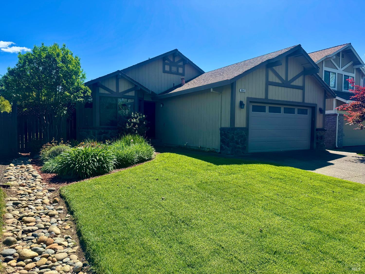 10845 Rio Ruso Drive Windsor, CA 95492 - Photo 1 of 1 a front view of a house with garden
