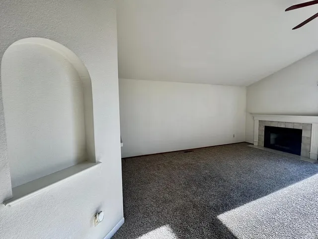 a view of a room with a hallway