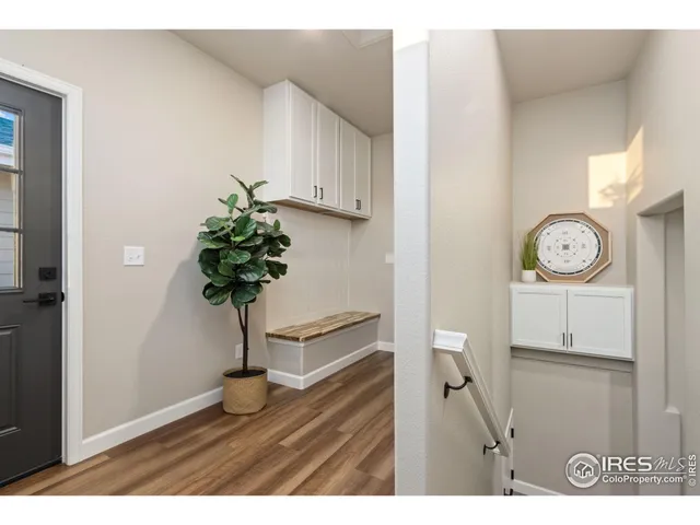 a view of room with wooden floor