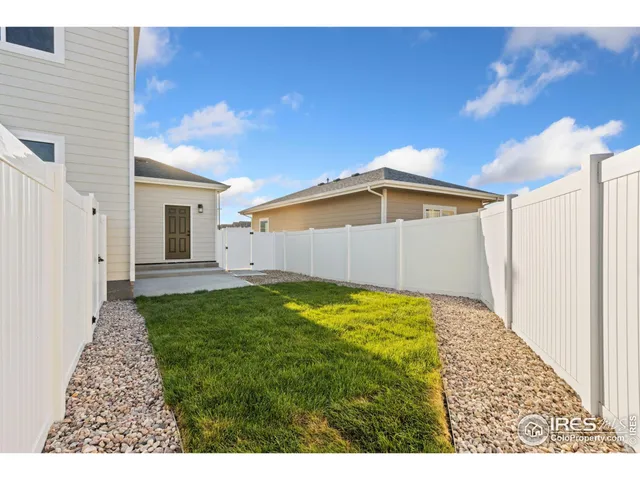 a view of backyard with hardwood