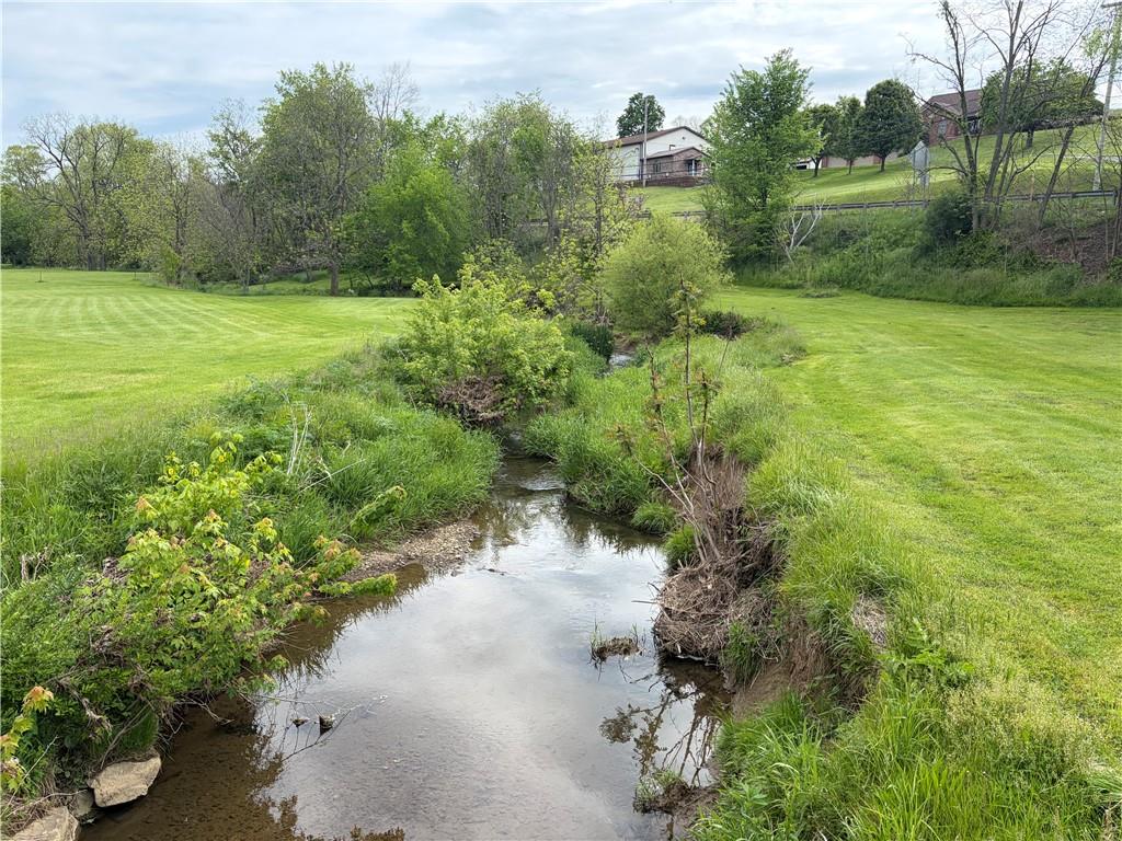 420 Old Plank Road Washington, PA 15301 - Photo 5 of 9 a view of a garden with a lake