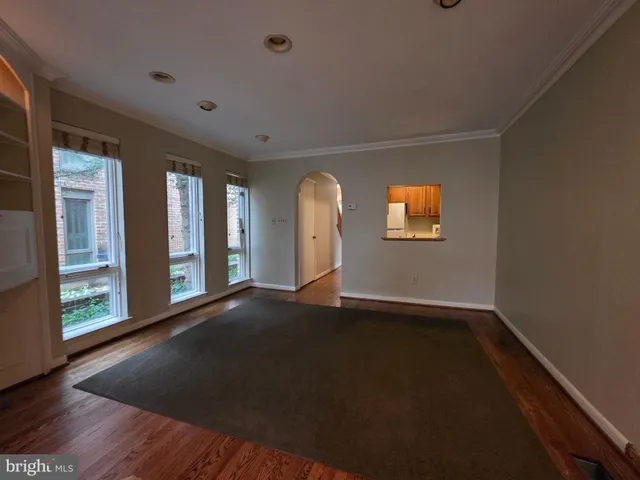 a view of an entryway with a chandelier fan
