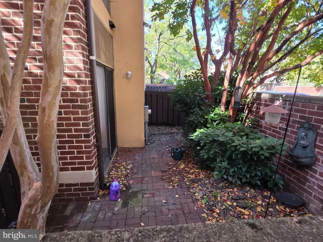 a view of a pathway along the building