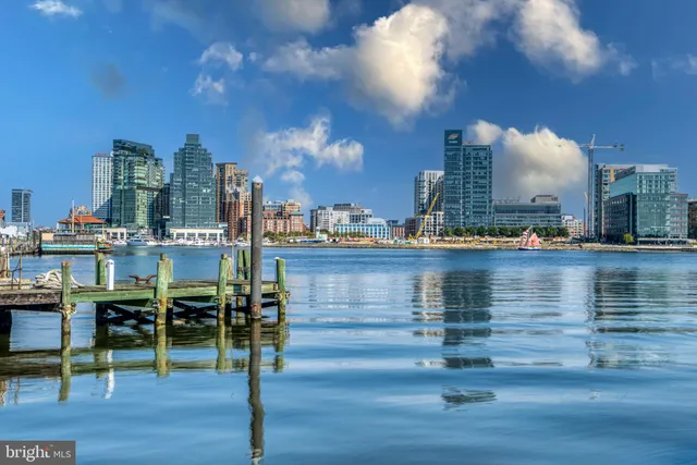 a view of a water fountain in front of a house