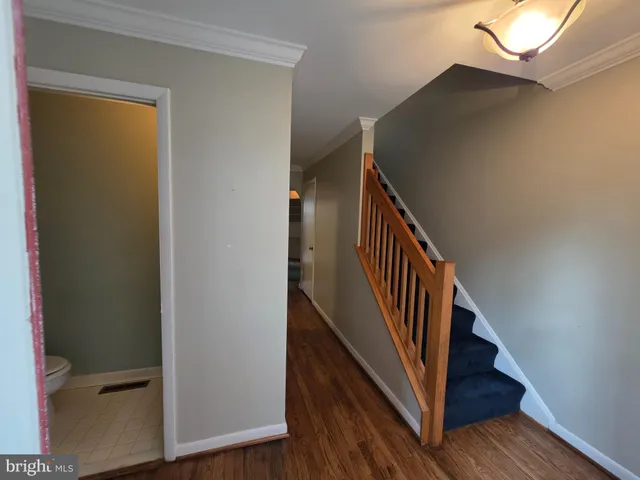 a view of a hallway with staircase