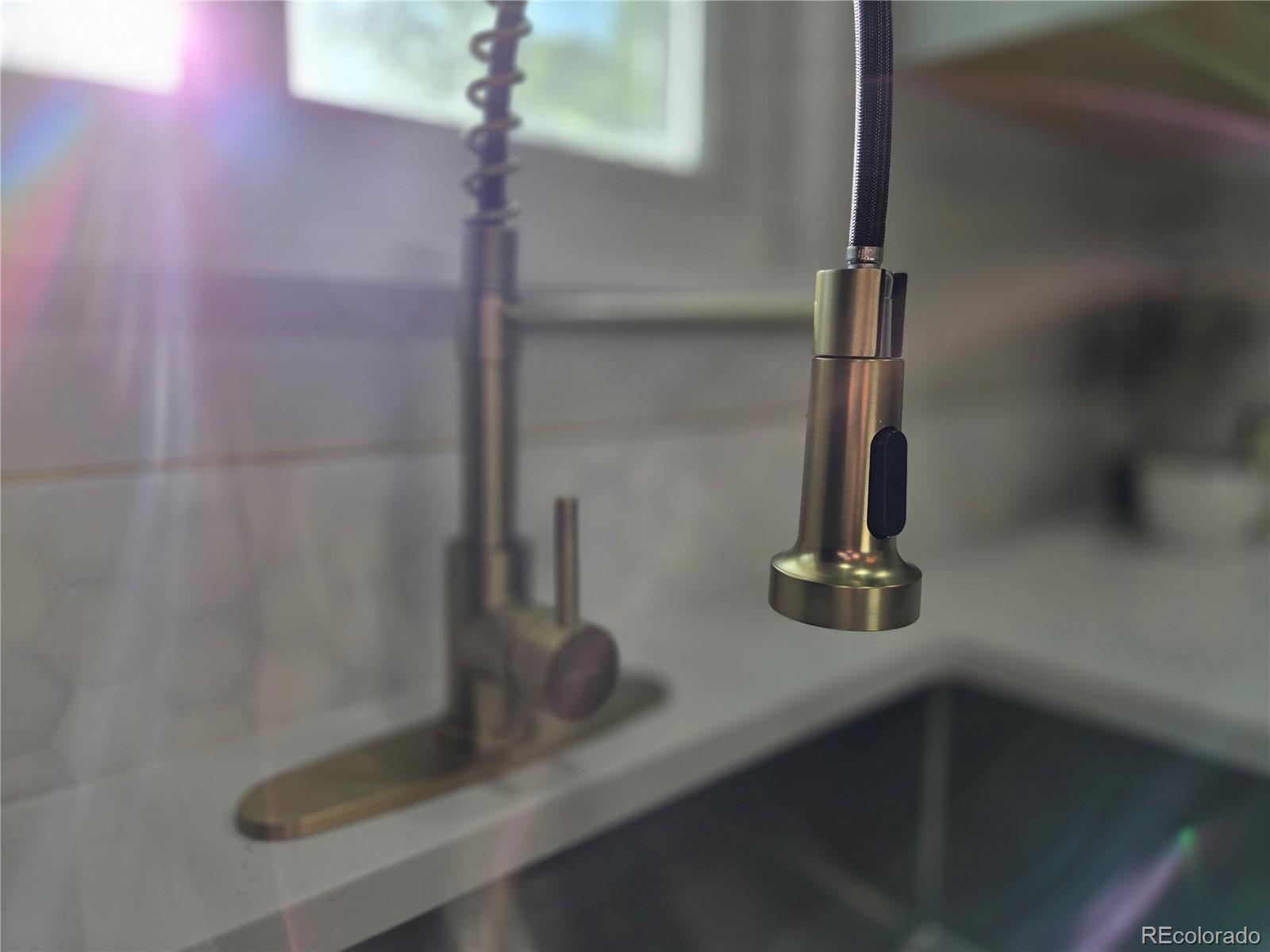 1250 South Monaco Parkway, Unit 17 Denver, CO 80224 - Photo 11 of 29 a bathroom with a sink