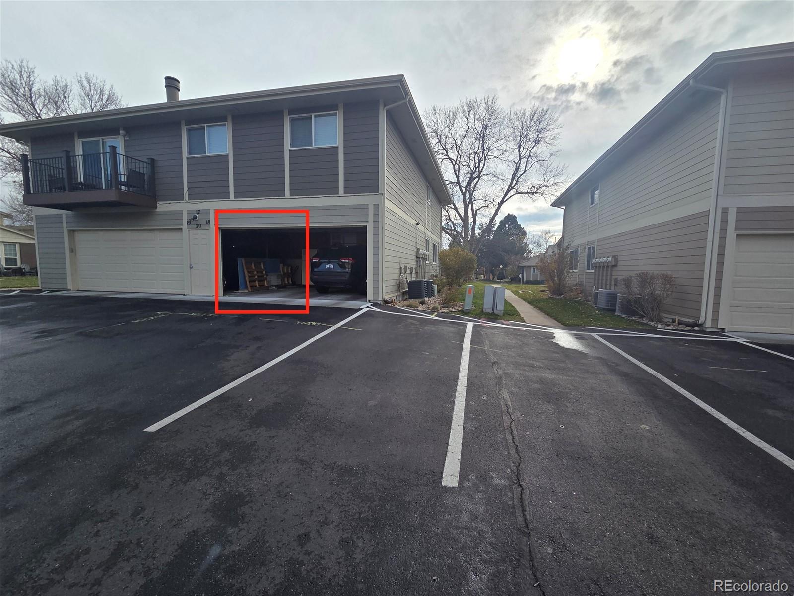 1250 South Monaco Parkway, Unit 17 Denver, CO 80224 - Photo 26 of 29 a view of a house with a street