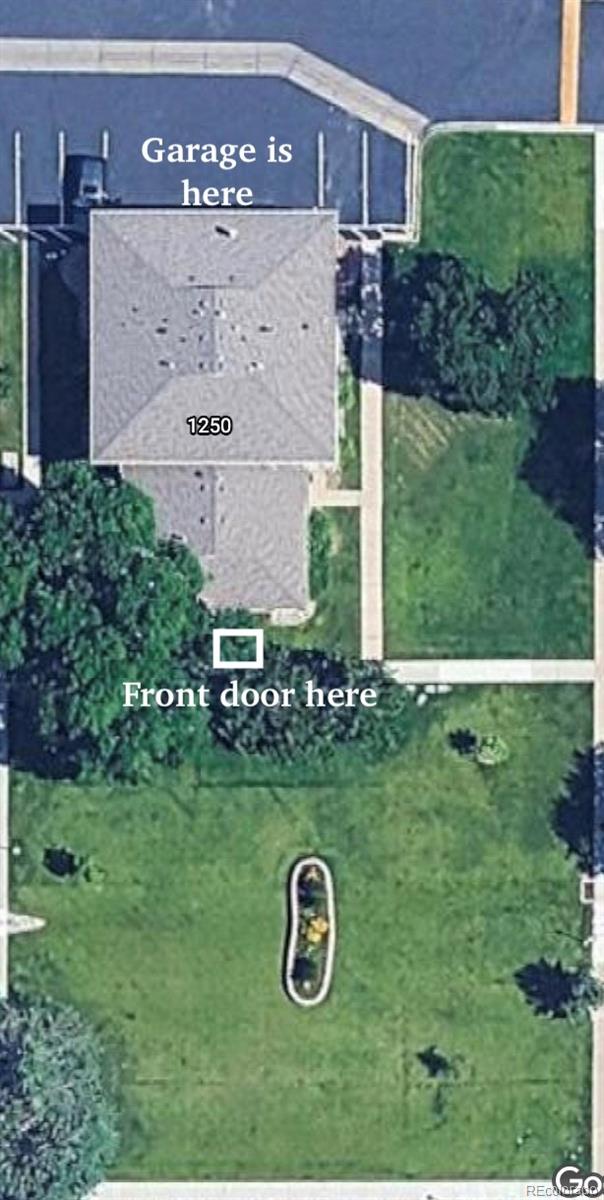 1250 South Monaco Parkway, Unit 17 Denver, CO 80224 - Photo 28 of 29 a view of a back yard of the house