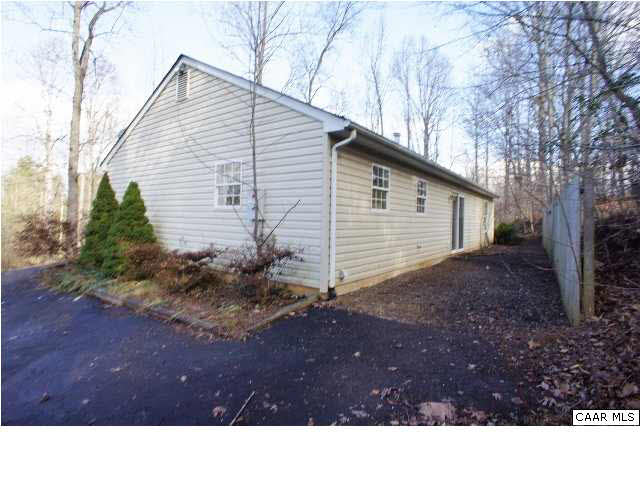 55 Gardenia Road Ruckersville, VA 22968 - Photo 13 of 13 a backyard of a house with lots of green space