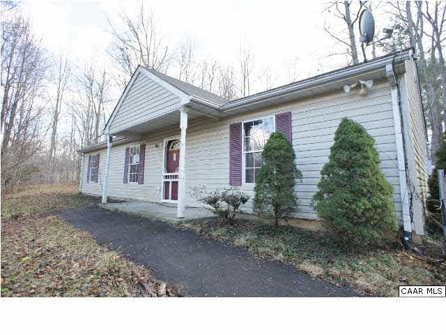 55 Gardenia Road Ruckersville, VA 22968 - Photo 2 of 13 a black and white photo of a house