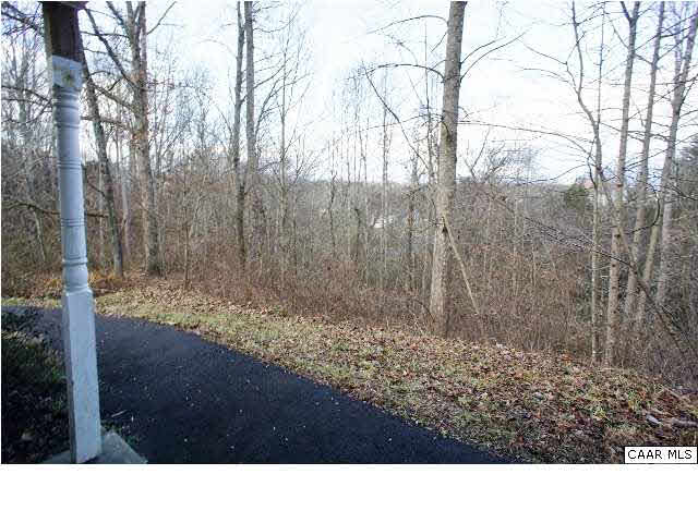 55 Gardenia Road Ruckersville, VA 22968 - Photo 3 of 13 a black and white photo of a house
