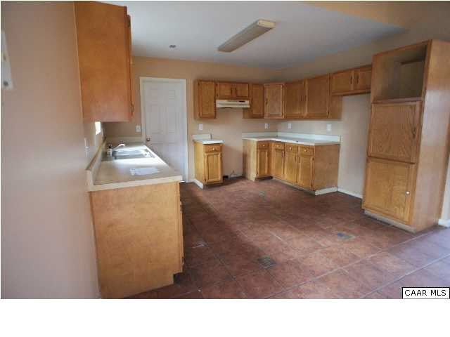 55 Gardenia Road Ruckersville, VA 22968 - Photo 6 of 13 a kitchen with appliances and cabinets