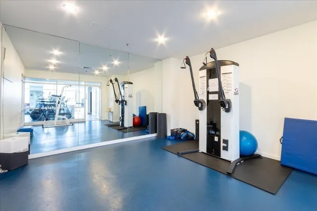 a view of a room with gym equipment