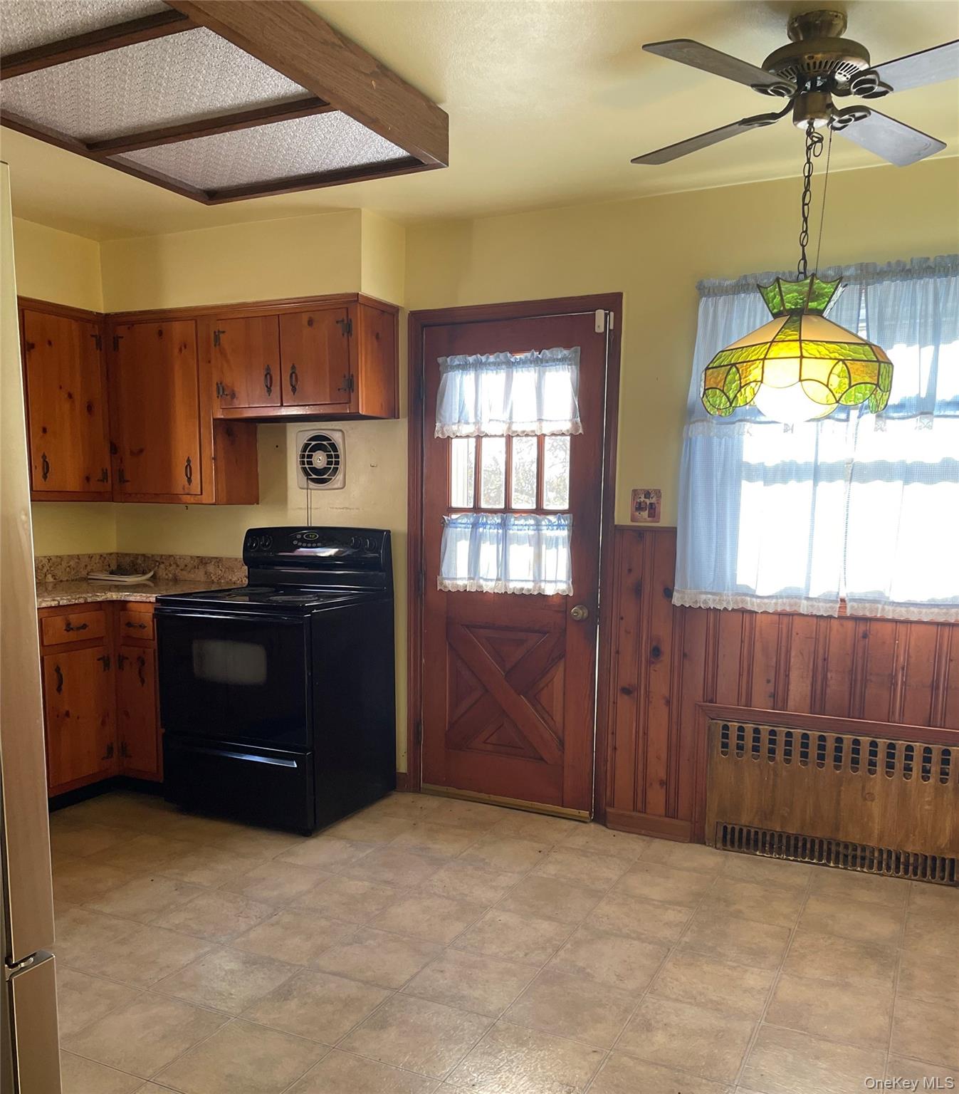 8 Atlantic Avenue Blue Point, NY 11715 - Photo 11 of 24 a kitchen that has a lot of cabinets in it