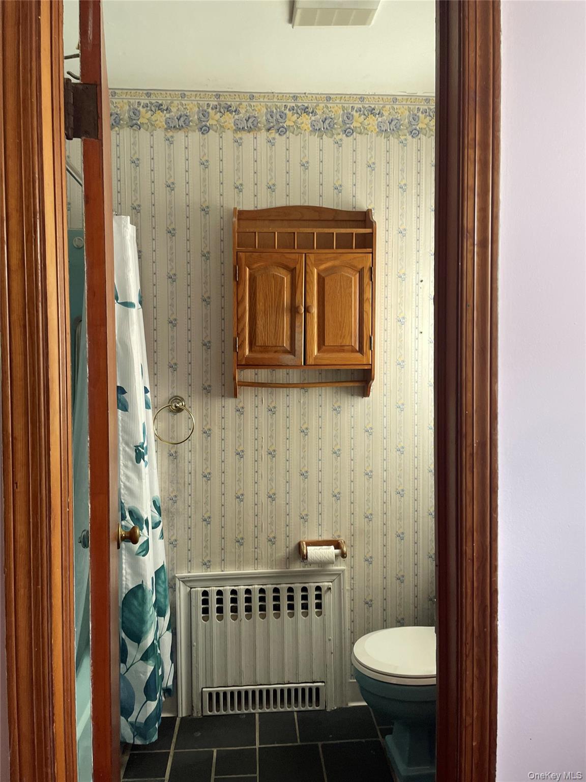 8 Atlantic Avenue Blue Point, NY 11715 - Photo 18 of 24 a bathroom with a toilet and a sink