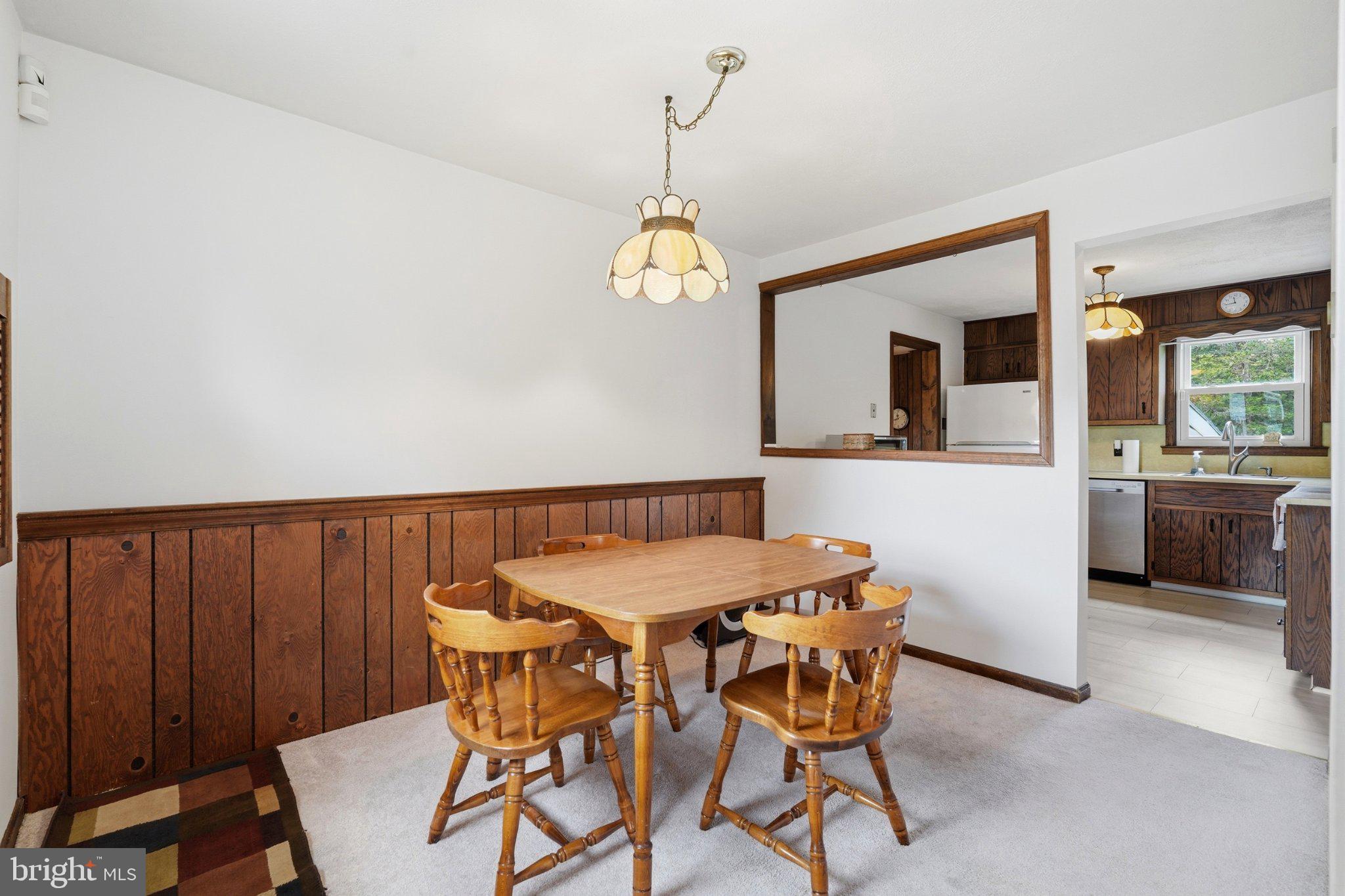 1385 Woodmere Road Pottstown, PA 19464 - Photo 18 of 63 Cozy dining nook with warm wood accents.
