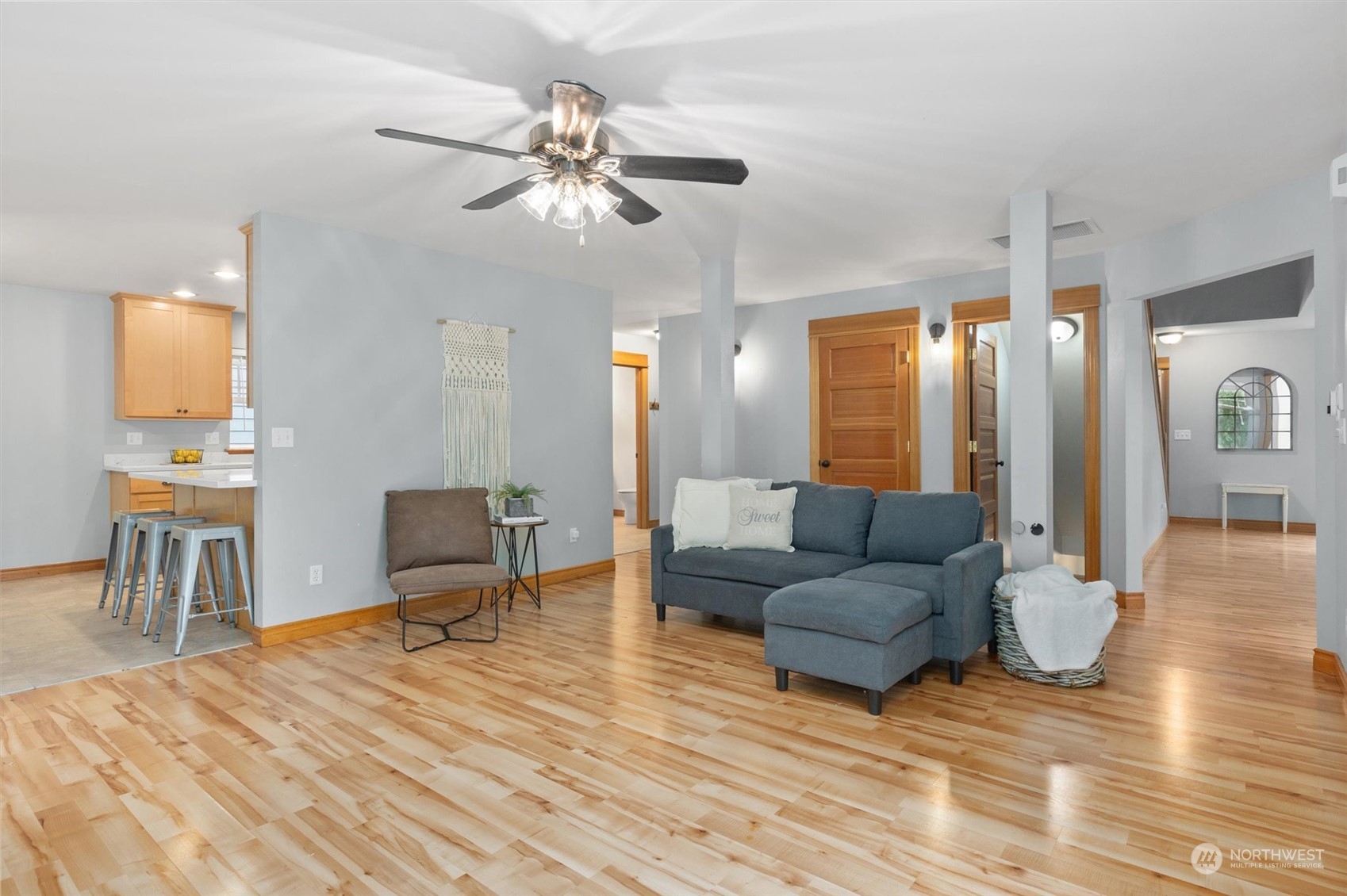 18606 Rainier View Road Southeast Monroe, WA 98272 - Photo 11 of 40 a living room with furniture and a wooden floor