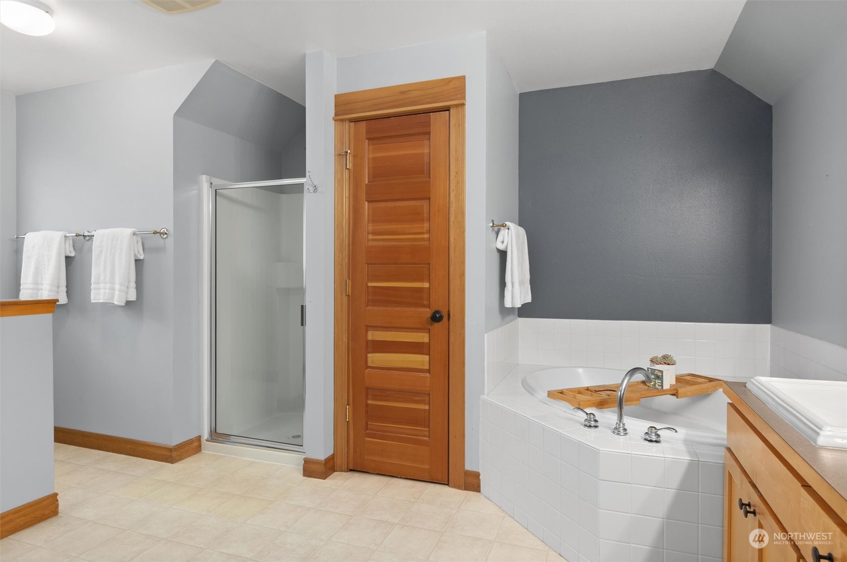 18606 Rainier View Road Southeast Monroe, WA 98272 - Photo 23 of 40 a bathroom with a sink and a shower